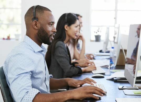 employees working at help desk